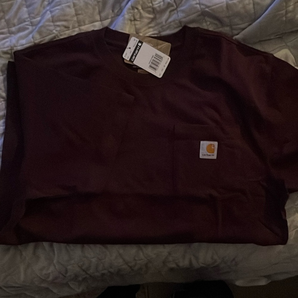 Carthartt Men Medium short sleeve T with pocket on front.